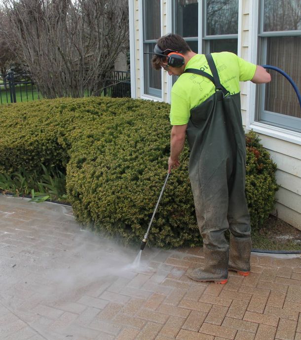 Pressure washing pavers